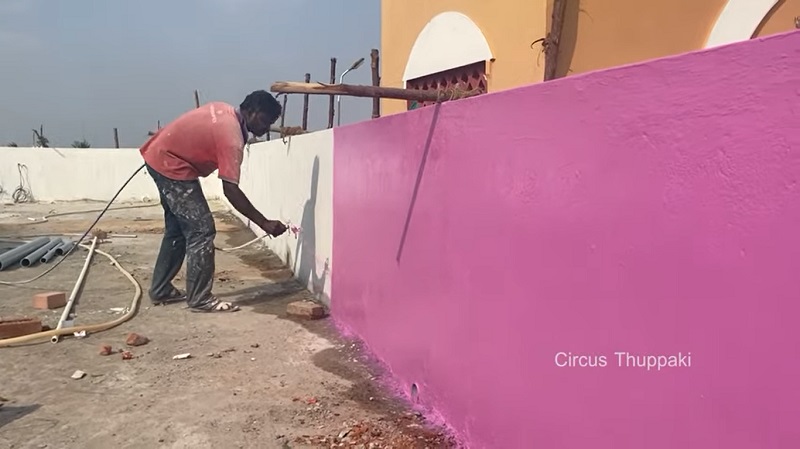 Painting A House with Spray Gun